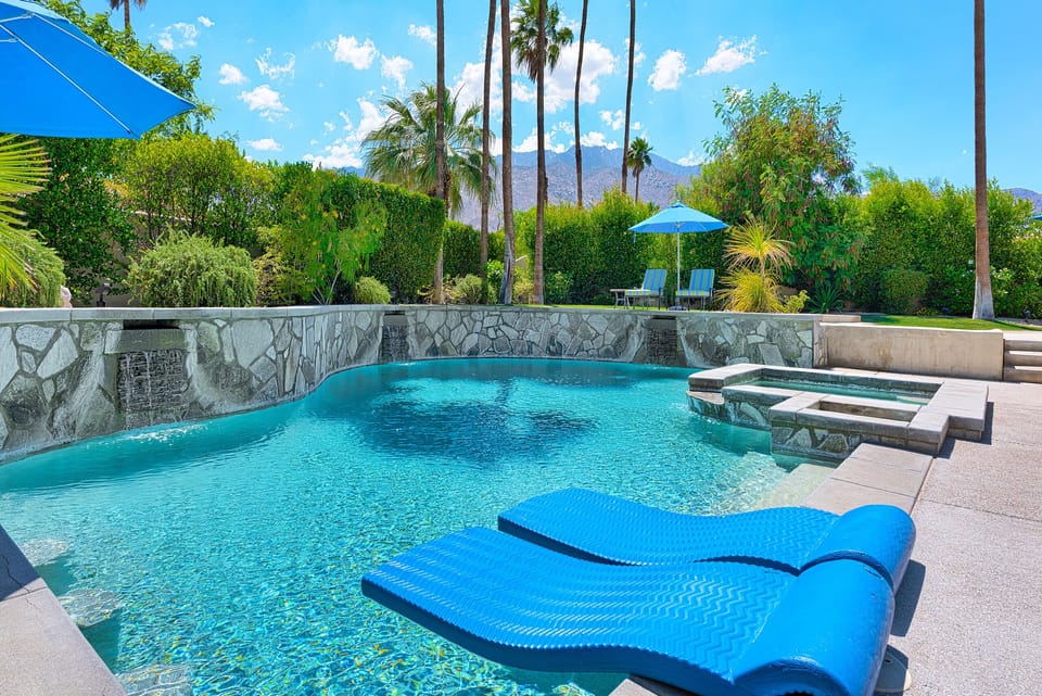Lagoon shaped saltwater pool with spa and waterfalls