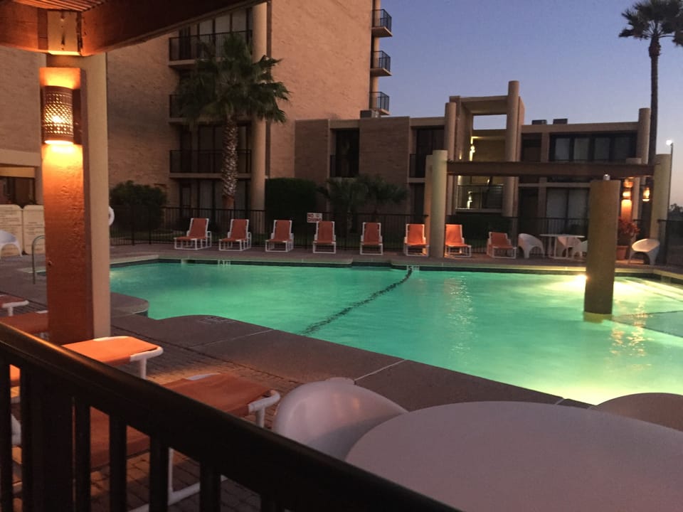 Swimming pool ... Building 1.  Hot tub is to the right.  Closes at 10 p.m.