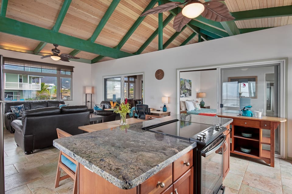Two bedrooms with attached bathrooms. Open ceiling for air but sound travels.