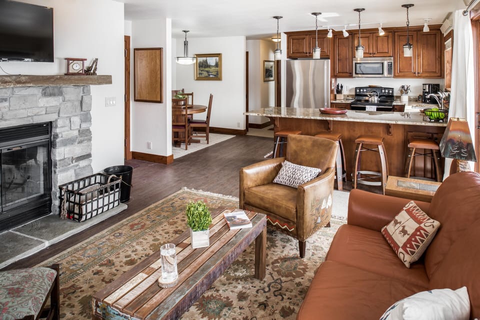 Living room looking to kitchen and dining area