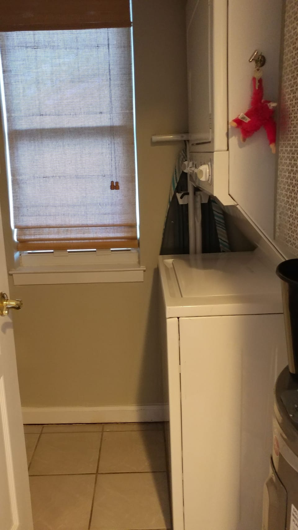 laundry room with wire shelving for extra storage