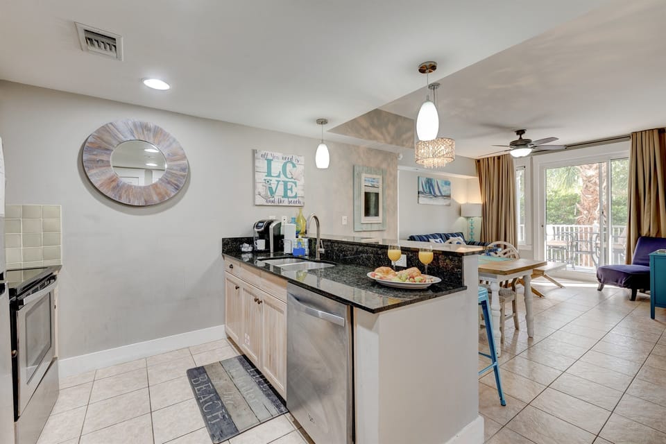 Enjoy beautiful pool and resort views from throughout the condo and kitchen!