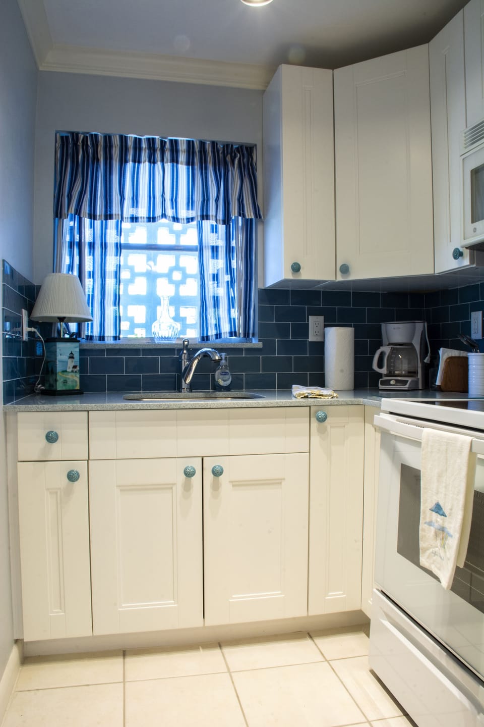 Kitchen window, oven, stove, microwave all conveniences you need to feel at home