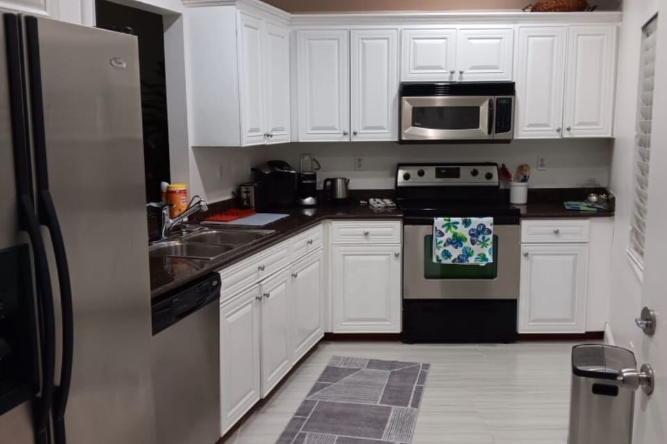 updated kitchen stocked with everything necessary for a gourmet meal.