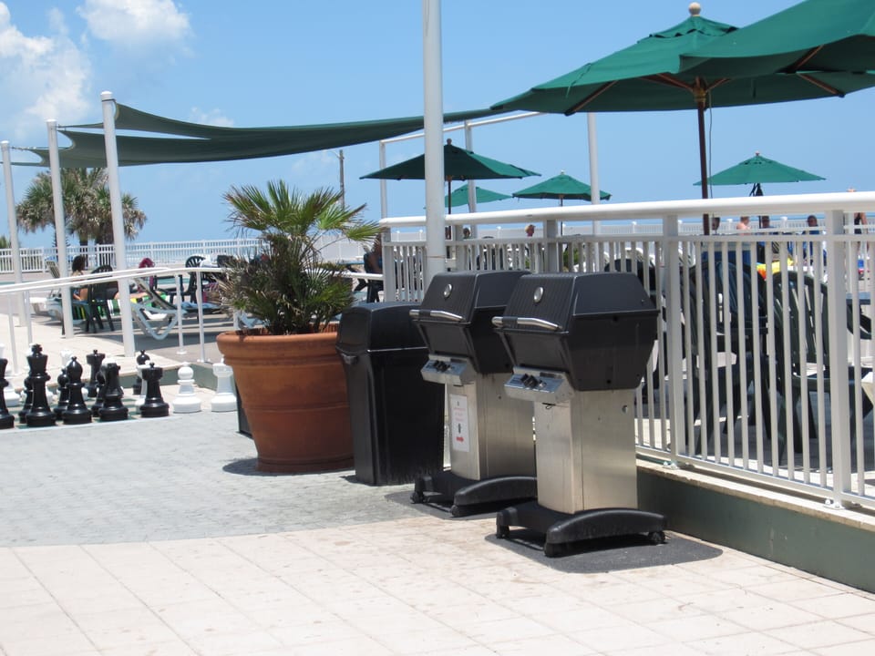 Two of the five gas grills on property