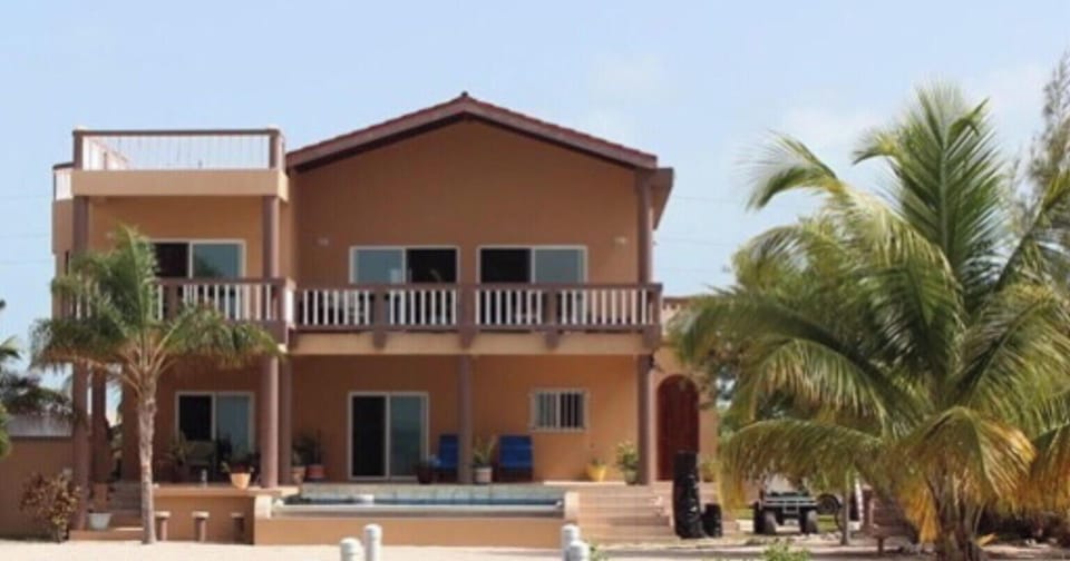 Wake up to waterfront views and unwind by the private pool.