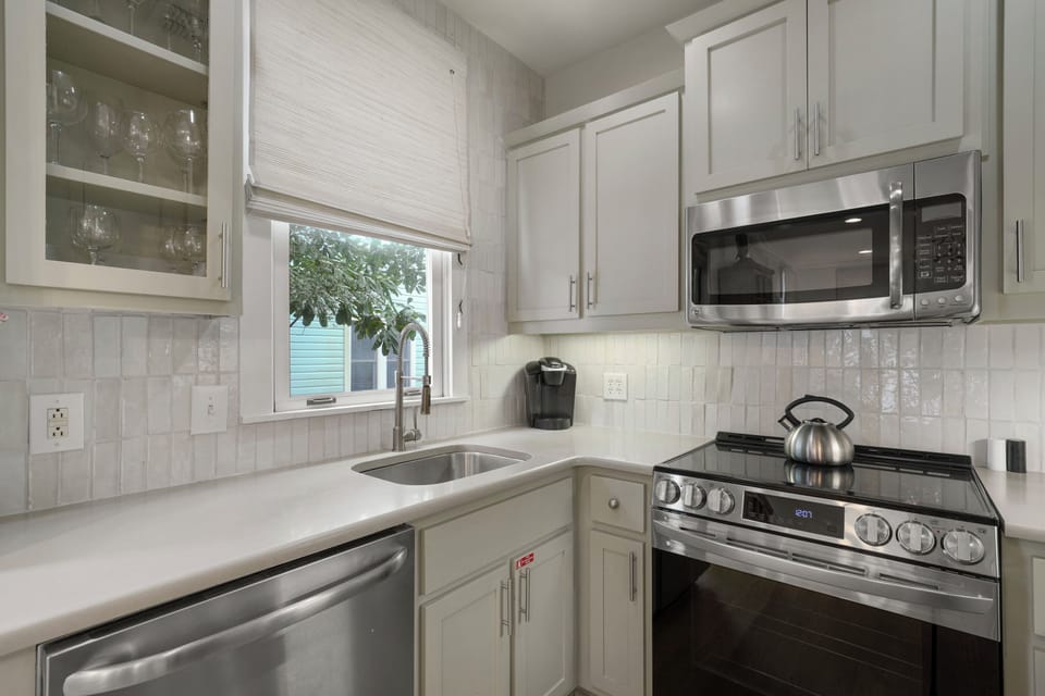 KITCHEN ALTERNATE VIEW WITH NATURAL LIGHT