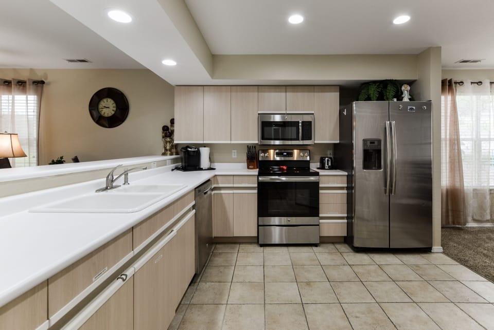 Kitchen, all new Stainless appliances, plenty of storage, tile floors.