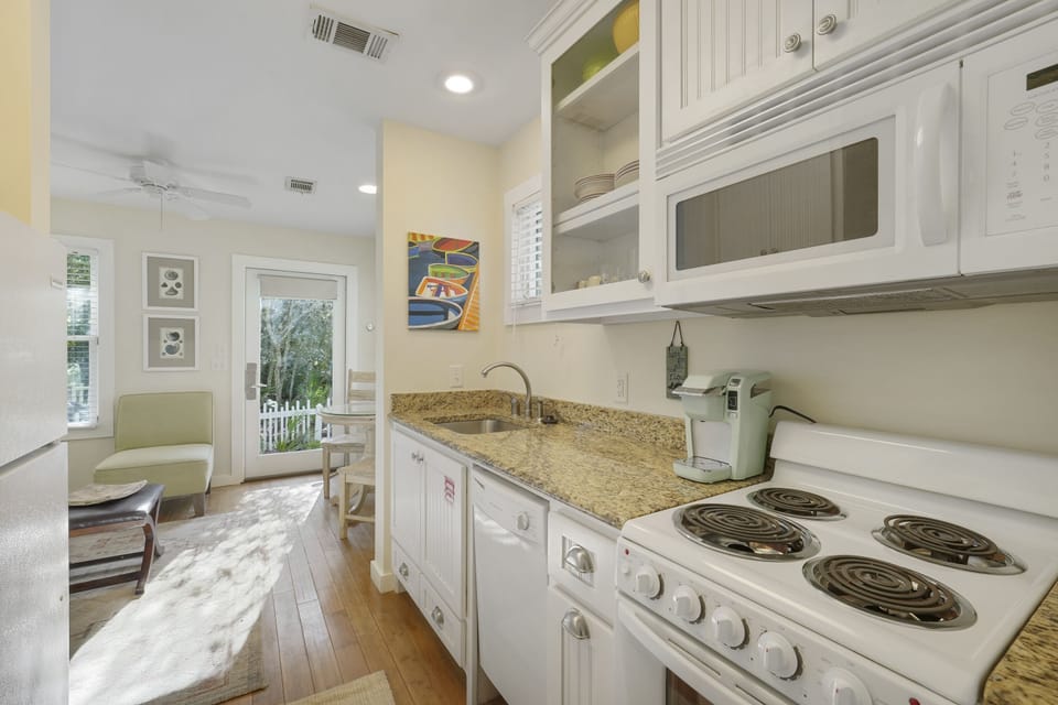 FULLY EQUIPPED, FUNCTIONAL KITCHEN OFF LIVING