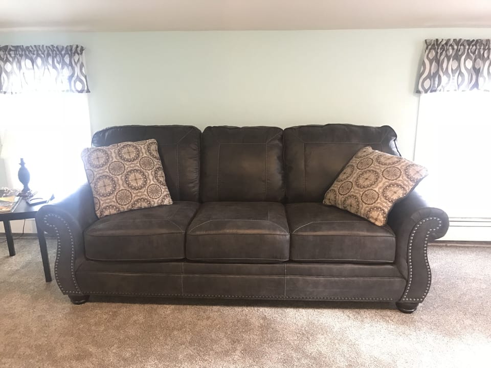 Comfy sofa with queen sized pull out bed. 