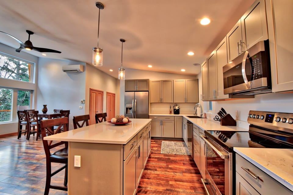 Open kitchen with quality stainless steel appliances & Starbucks espresso maker