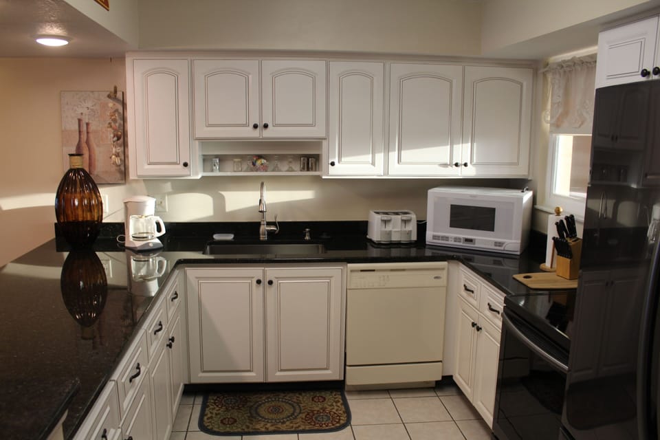Fully Stocked Kitchen with Granite Countertops