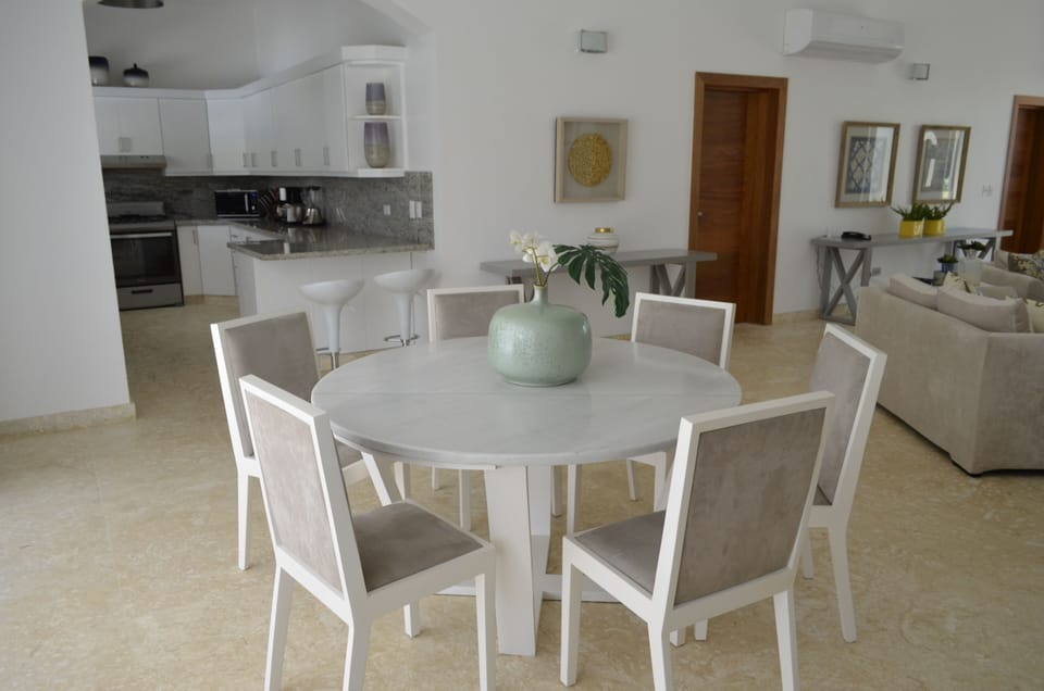 Marble tabletop indoor dining table and six chairs