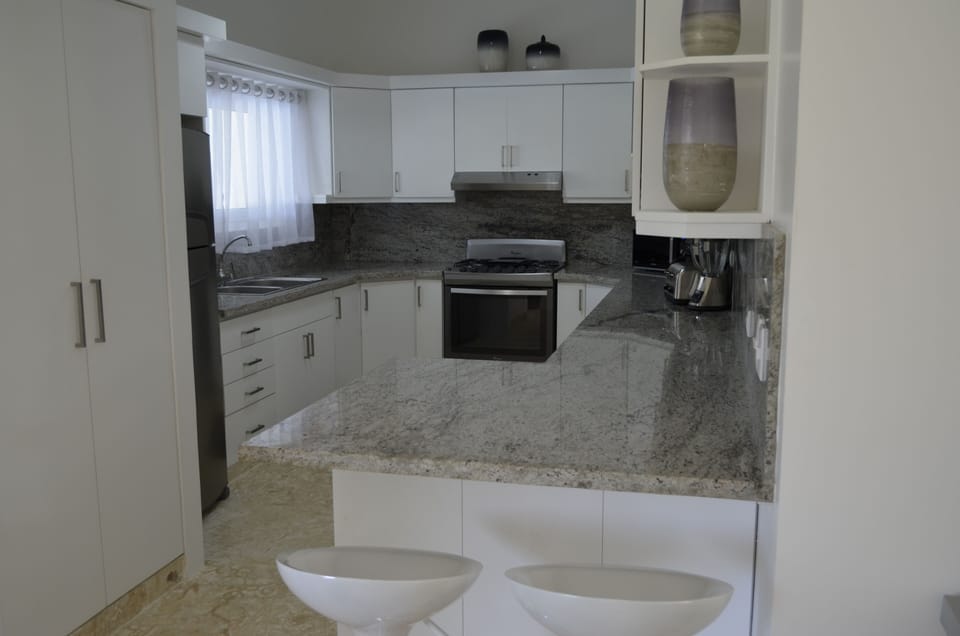 Large custom kitchen,  exotic granite including full backsplash