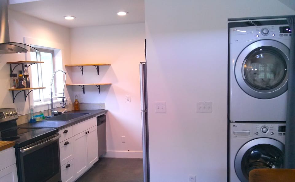 More kitchen - full size washer dryer
