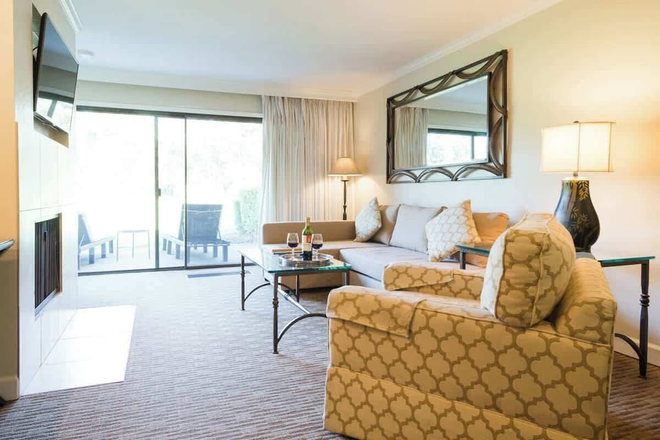 Relax in the sofa while enjoying the $ million view on the golf course