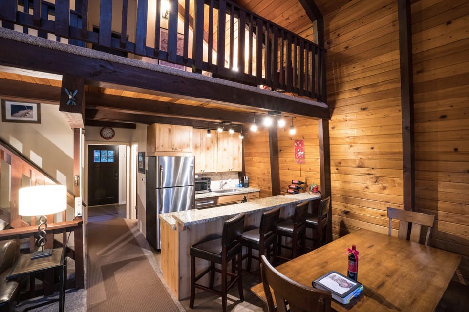 Main Level: Dining Room, Kitchen (view to back door, deck access)