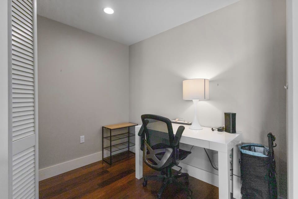 Office area - Small desk adjacent to the living area and kitchen offers a place to work and conduct business.