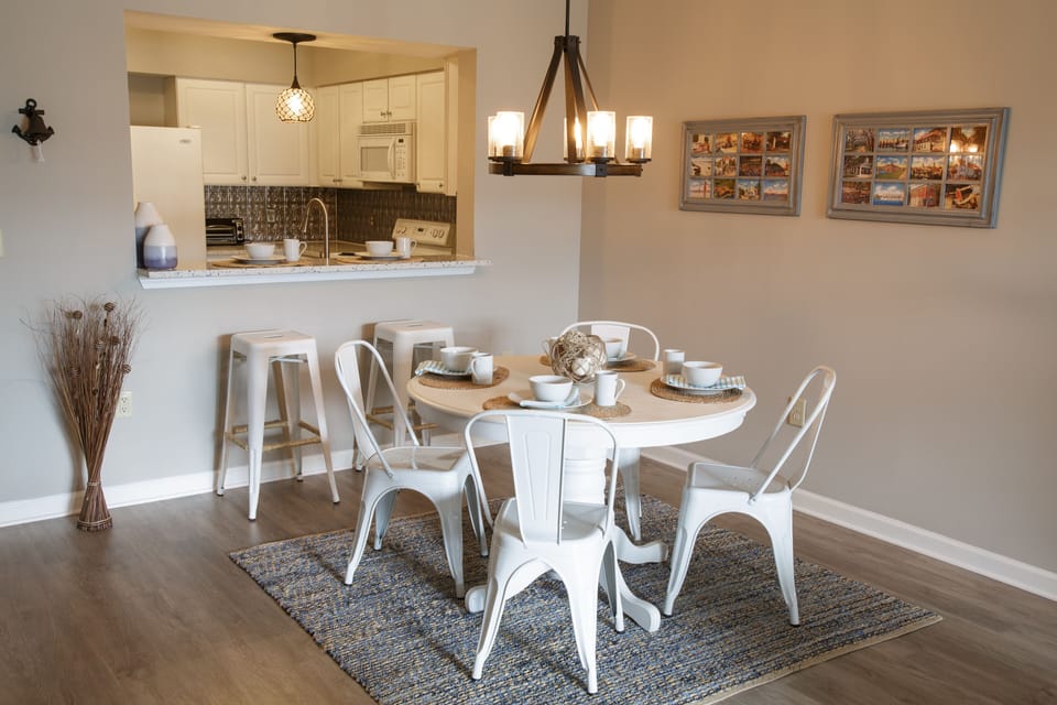 Gather the family around for a meal. This dining table now seats up to 8