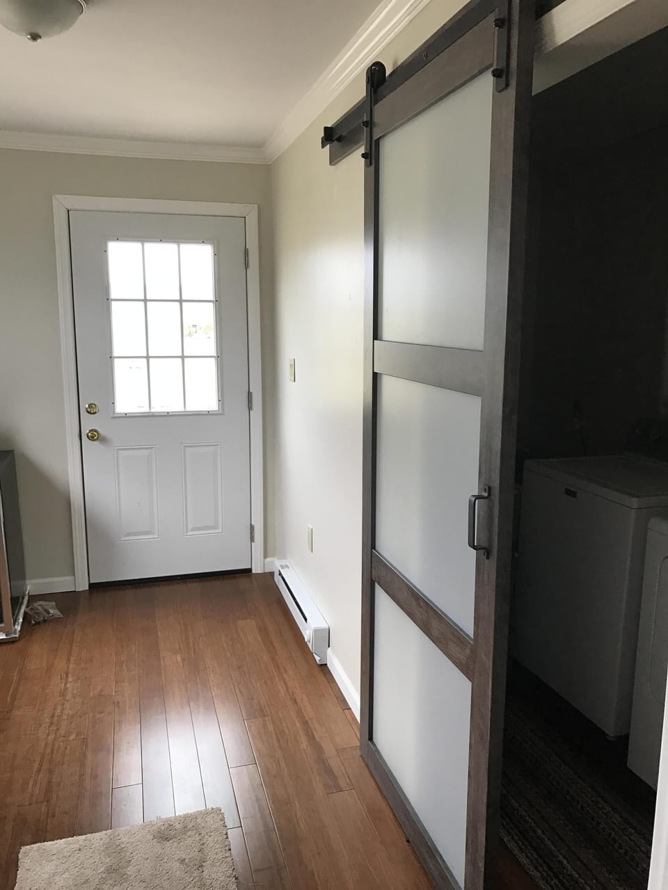 Back Mudroom entrance with great laundry room and storage.