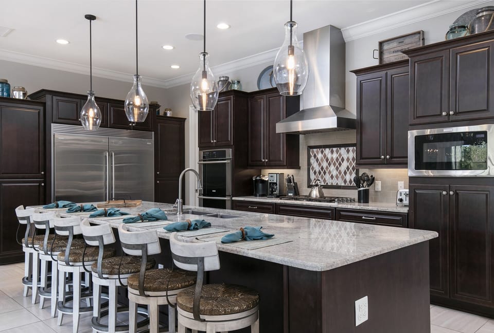 Spacious kitchen area with a breakfast bar