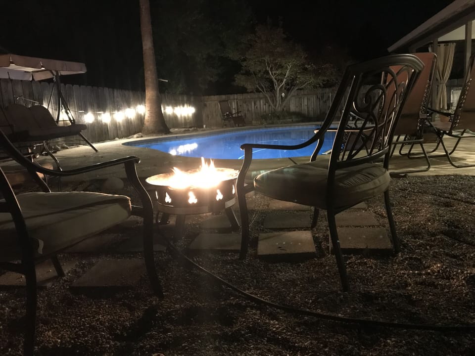 Create special memories while sitting around this warm fire pit.