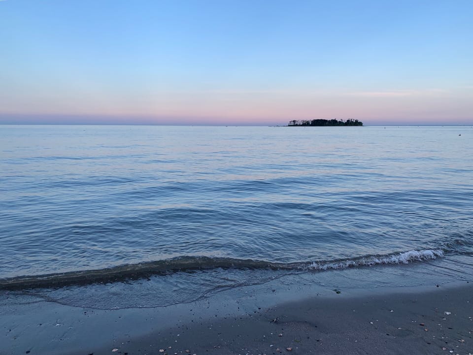 How peaceful and beautiful - dusk by the beach right across the street!
