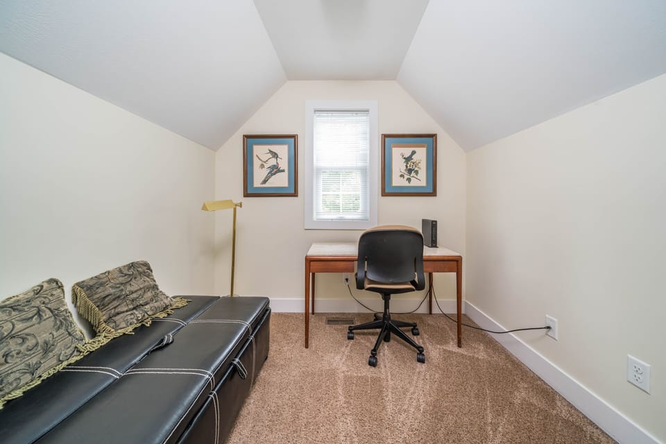 second floor bedroom w/ queen bed and tandem room w/ twin pullout and office.