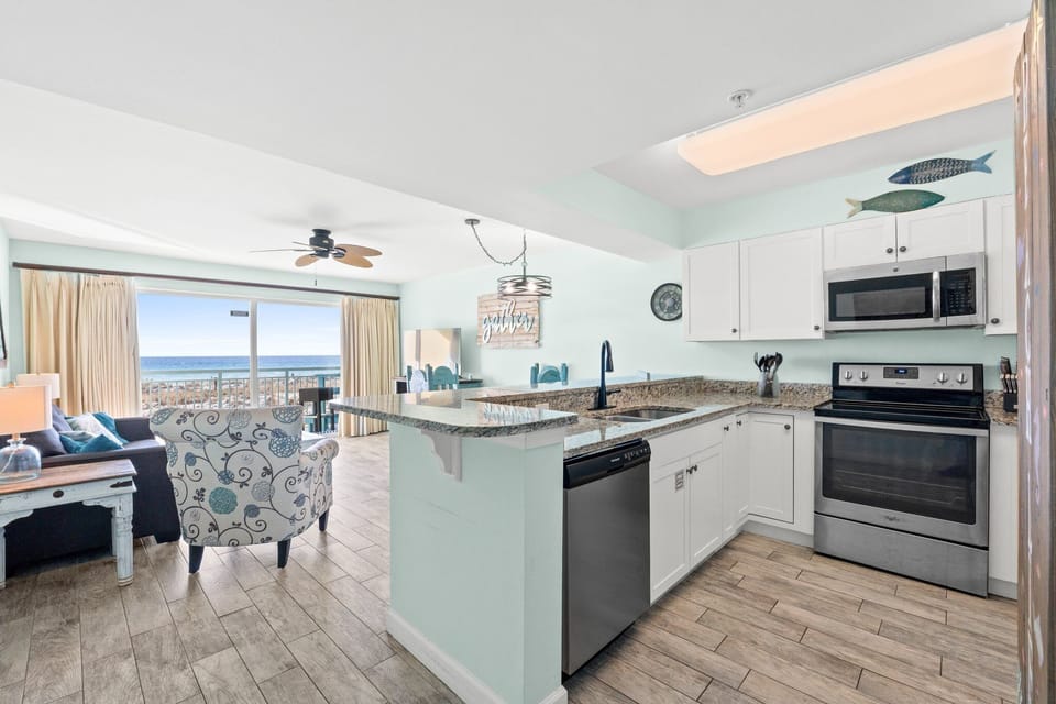 Full Kitchen - Living Area - Sleeper Sofa - Ocean and Pool View - Cable & Smart TV - Dining Area