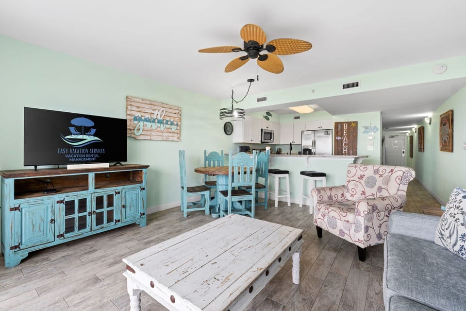 Living Area - Balcony Access - Sleeper Sofa - Ocean and Pool View - Cable & Smart TV - Dining Area