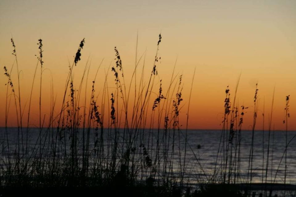 Sunset on the beach is footsteps away. Beautiful every day! 