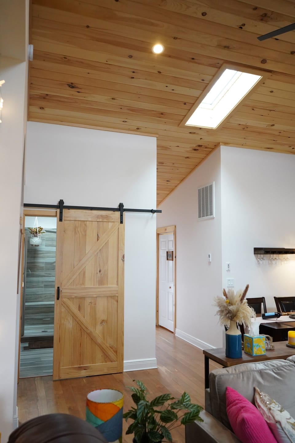 Barn door to the full bath.