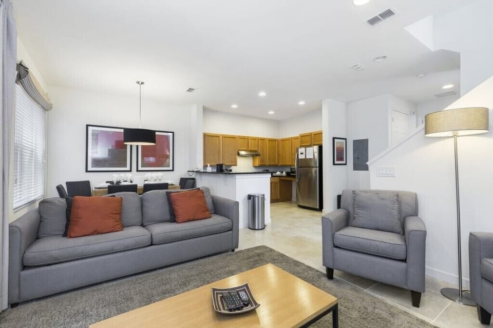 Open-concept living space with modern furniture and a welcoming atmosphere for your stay.