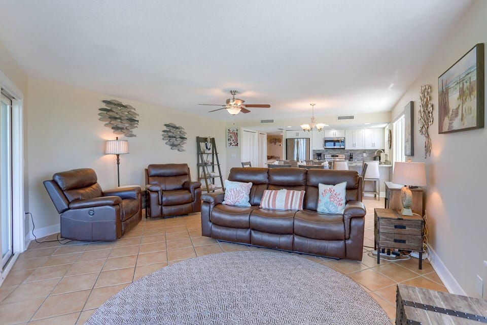 Living Room Offers a Leather Sofa, Leather Recliners, and Flat Screen Cable TV!
