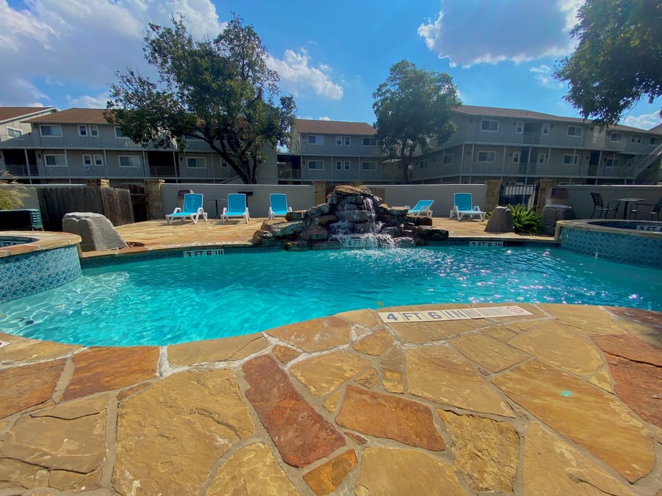 One of the many pools on property!