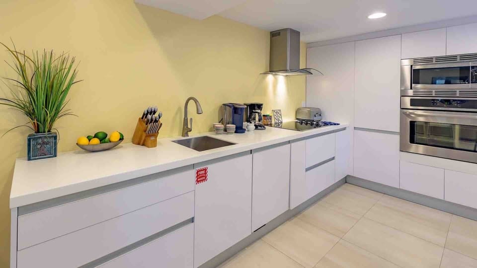 The kitchen has stainless steel appliances and plenty of cabinet space...