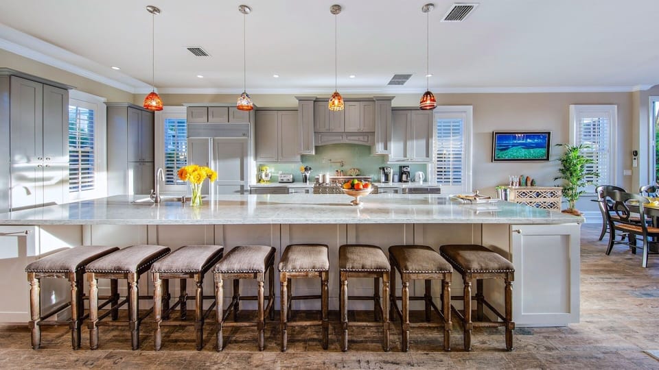 The kitchen island is huge, with bar seating included...