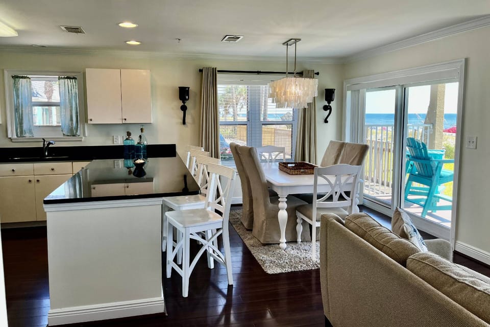 Open Floor Plan Overlooking Gulf and Beach ~ Great conversations throughout the Living Room, Dining Room & Kitchen