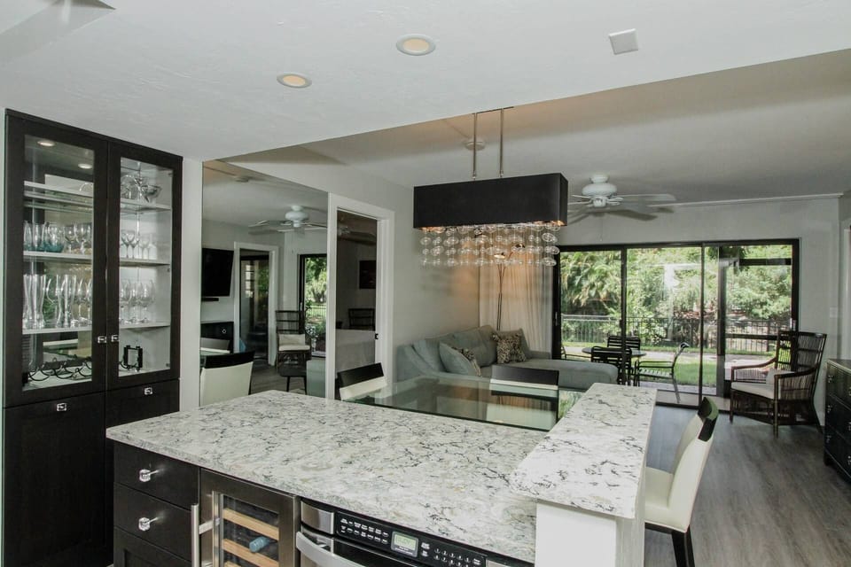 Custom designed kitchen remodel with wine cooler, pull out microwave drawer, & quartz counters....no detail overlooked.