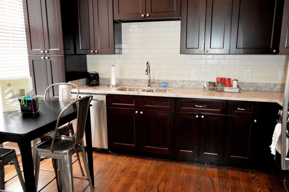 "L" shaped kitchen with stainless appliances