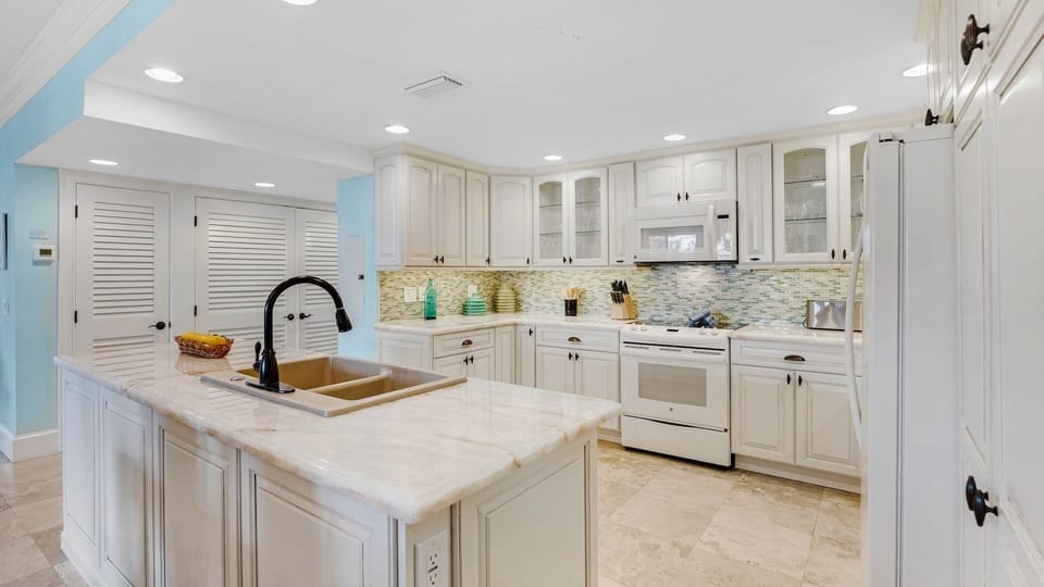 The fully renovated kitchen is equipped with every tool needed to prepare a meal...
