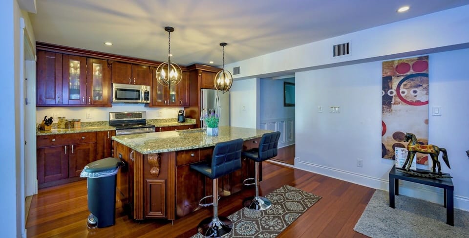 There's additional bar seating at the kitchen island...