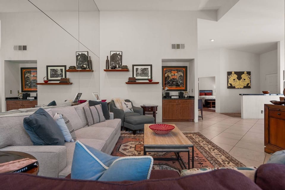 Open comfortable living area with TV and fire place