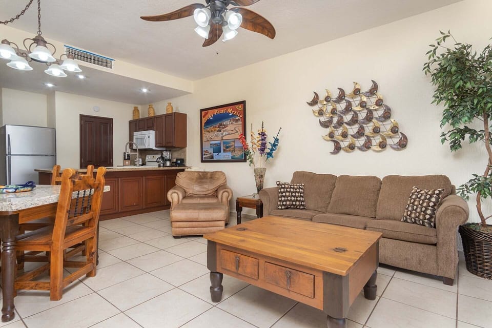 The living room offers cozy seating