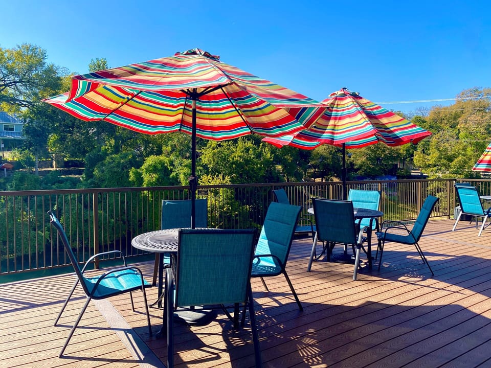 Deck seating overlooking the Comal River