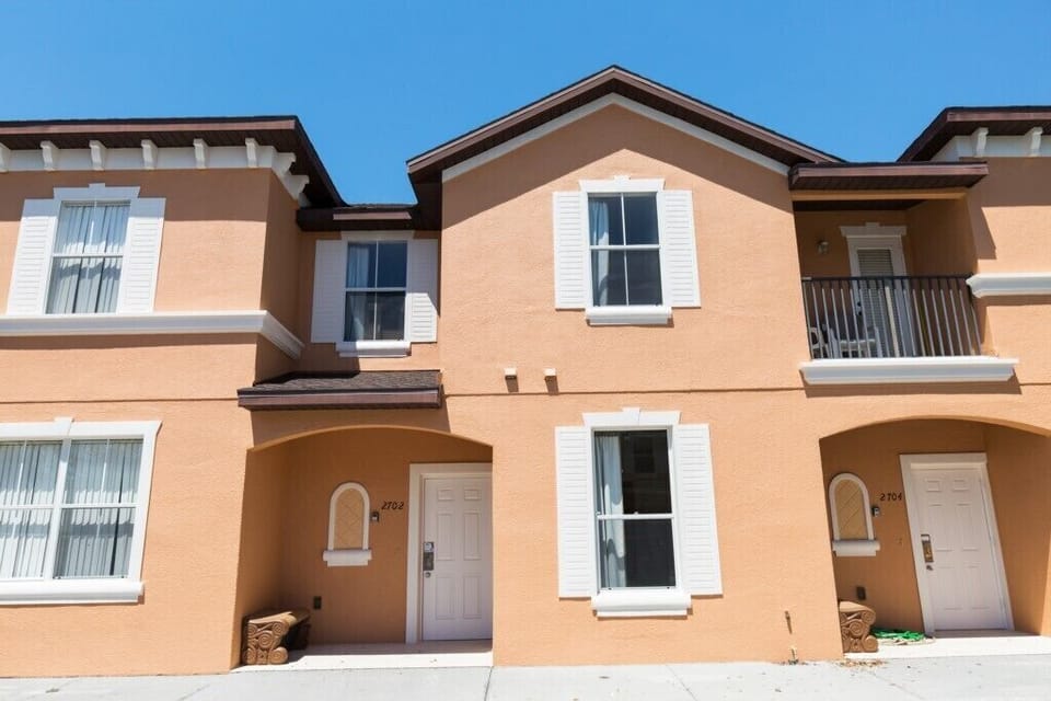 Charming exterior showcasing a modern townhouse design.