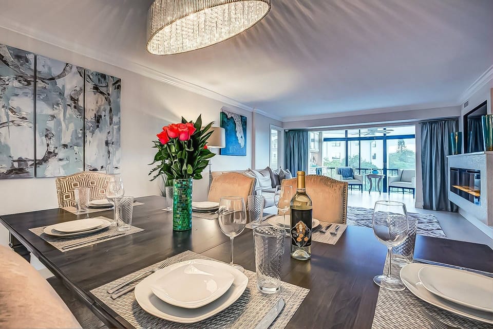 Spacious condo contains an open floor plan with dining chairs for 6 and another 3 bar stools to accommodate 9