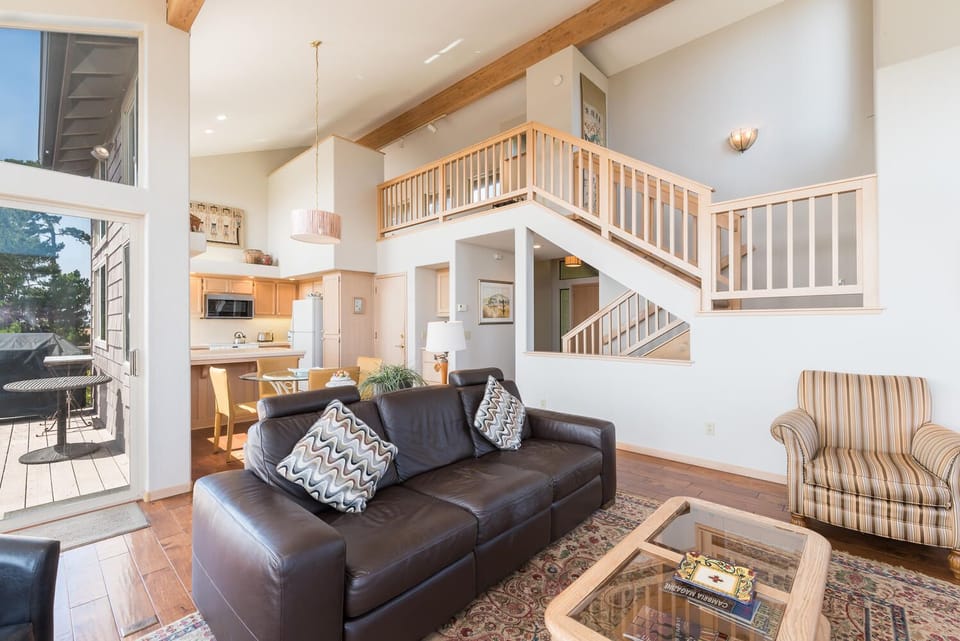 Living room, kitchen and loft view
