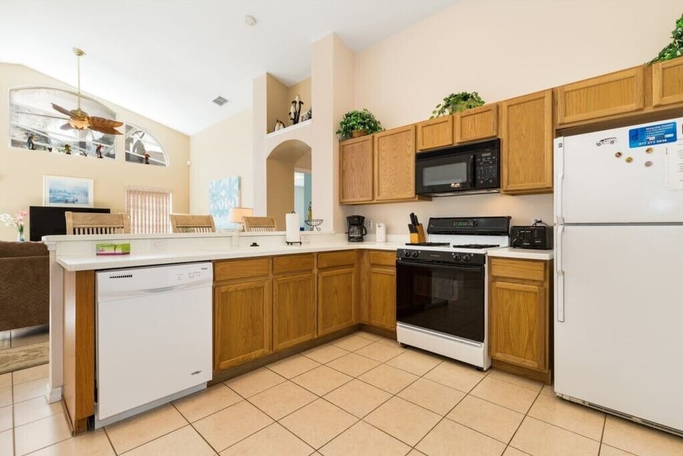 Fully equipped kitchen with updated appliances, ample storage, and everything you need to cook.