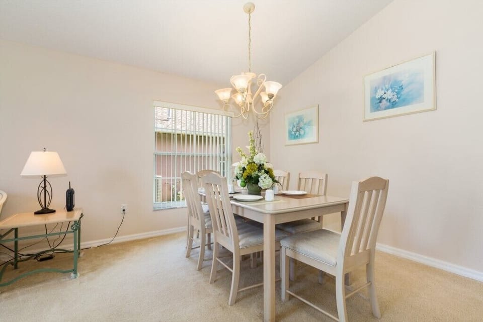 Modern dining area with ample seating, ideal for enjoying family meals or special gatherings.